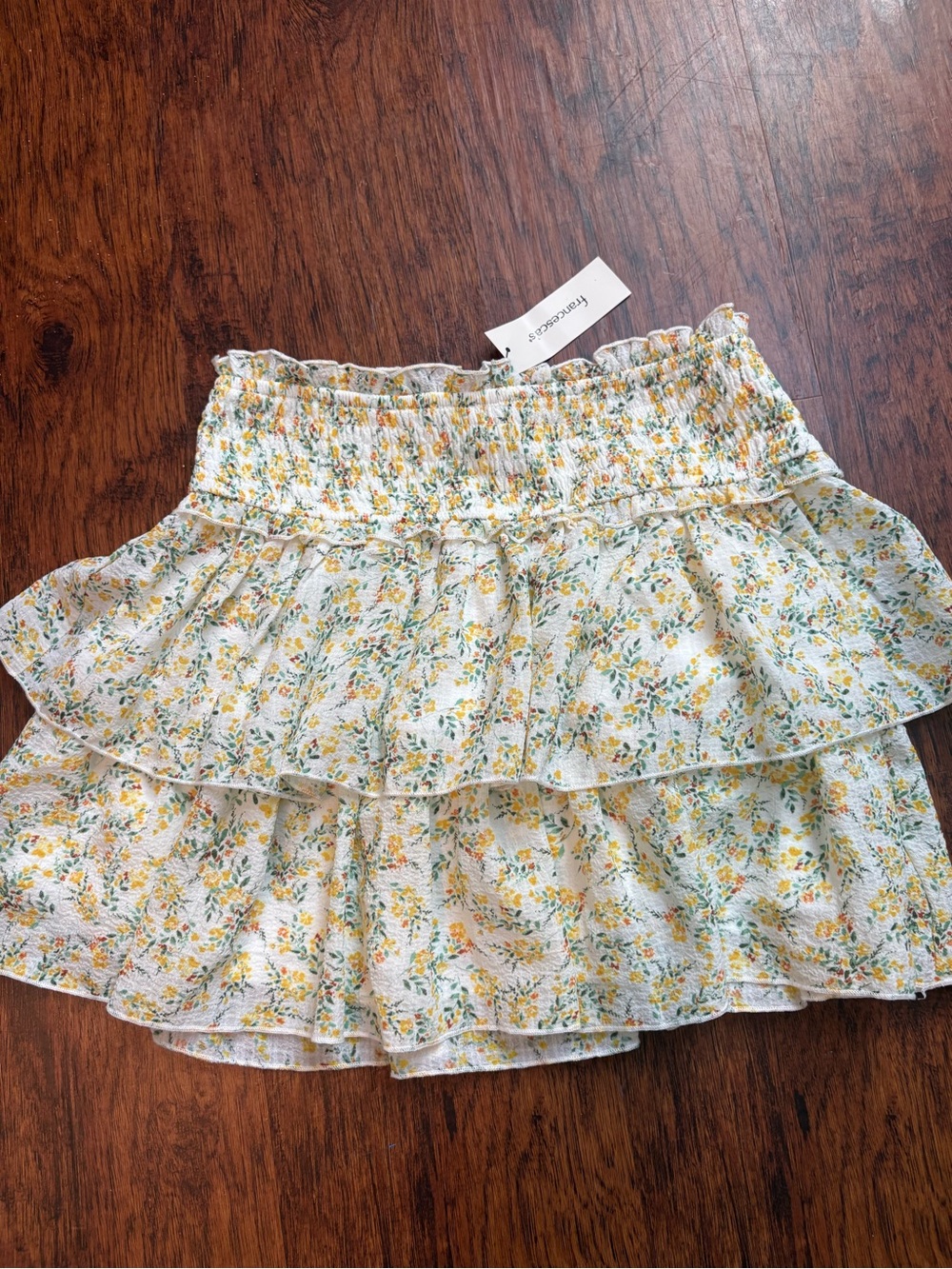 Francesca's Collections White Floral Tiered Mini Skirt with Yellow Accents